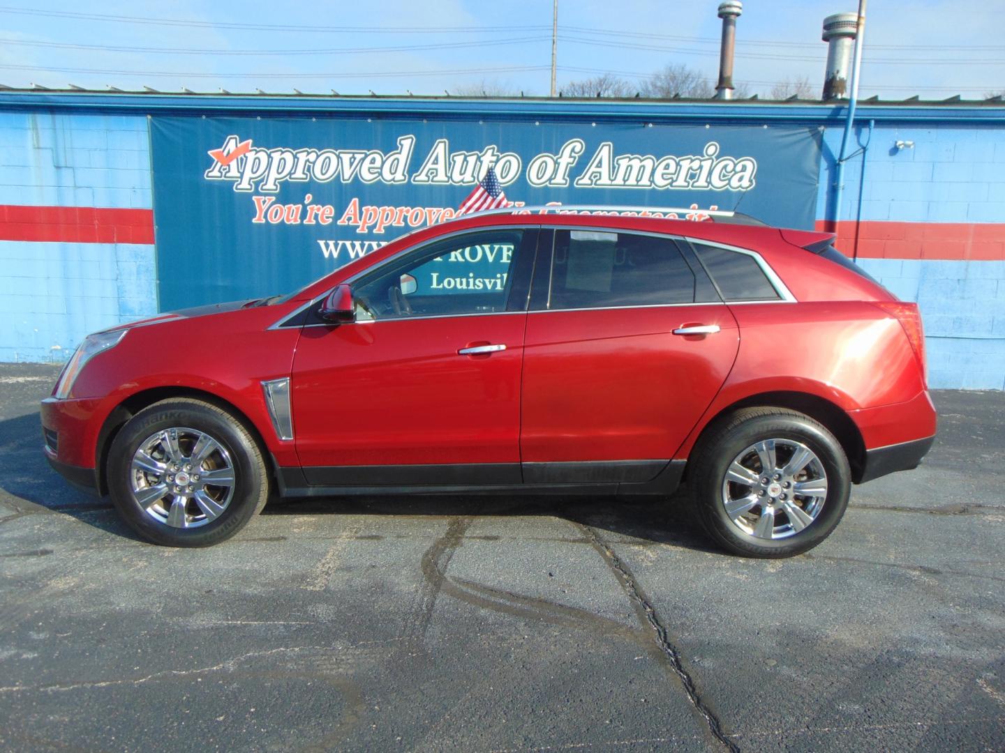 2016 Red Cadillac SRX (3GYFNBE37GS) with an V6 3.6 Liter engine, Auto, 6-Spd TAPshift transmission, located at 2105 Dixie Hwy, Louisville, KY, 40210, (502) 772-3333, 38.220932, -85.795441 - Photo#0